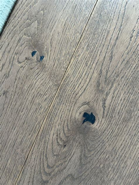 What are these spots appearing on engineered hardwood floor? : r/DIY