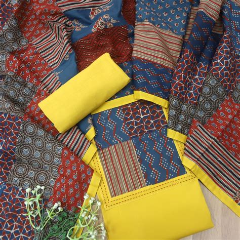 Aafeemi Beetle Yellow Ajrak Patches Neck Work Cotton Suit Set ...