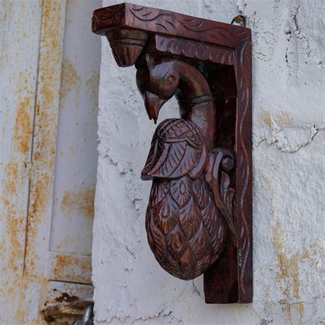 Solid teak dark mohagany stain peacock door bracket