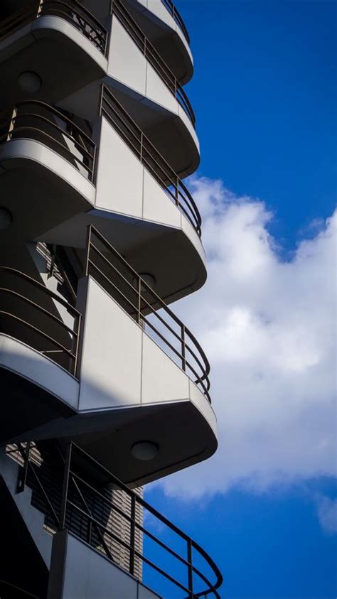 Download wallpaper 480x854 balconies, building, facade, sky nokia lumia ...