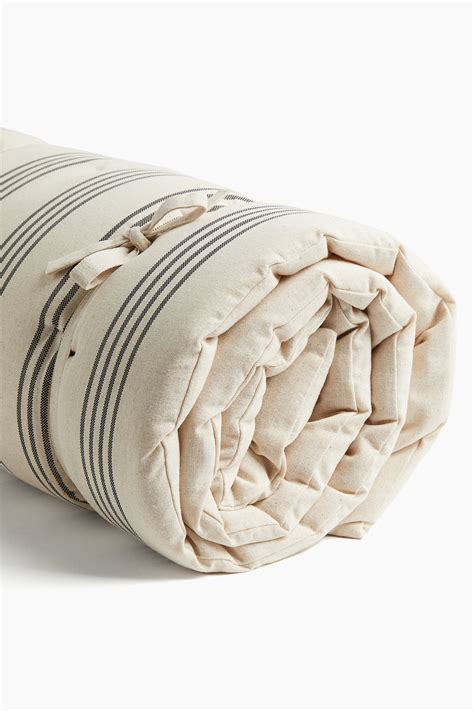 Beige/Striped Water-repellent beach mattress at H&M Home | H&M IN