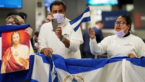 Emotional scenes at Dulles airport as over 200 Nicaraguan prisoners ...