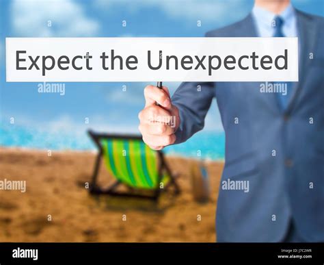 Expect the Unexpected - Businessman hand holding sign. Business ...
