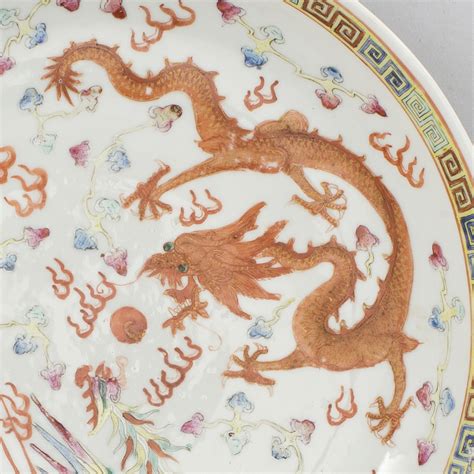 A dragon and phoenix dish with Qianlong six charachtere mark, about ...