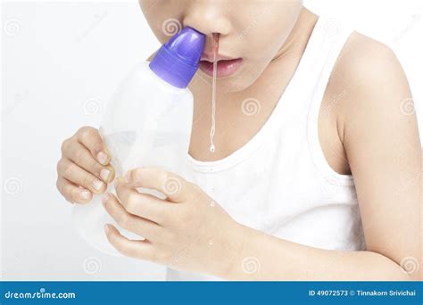 Children Nasal Clean by Saline Solution Stock Image - Image of people, water: 49072573