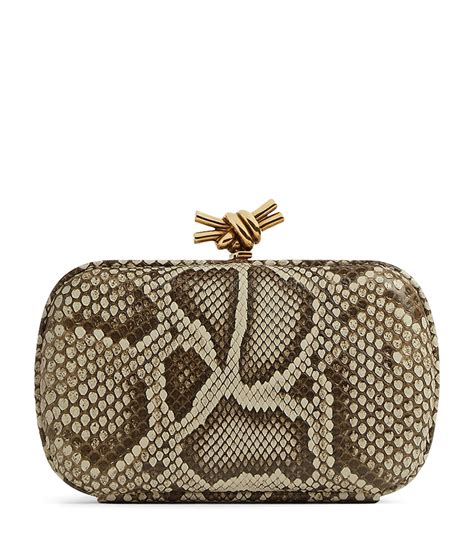 Bottega Veneta Snakeskin Knot Clutch Bag | Harrods US
