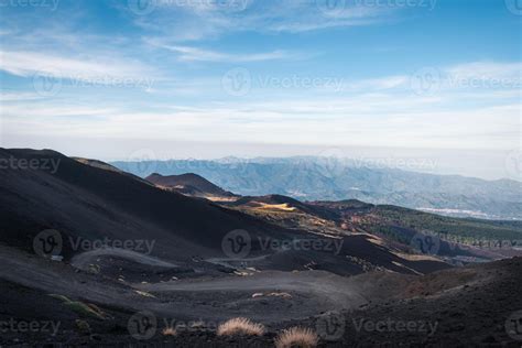 Landscape view on mount etna while it was erupting steam and high ...