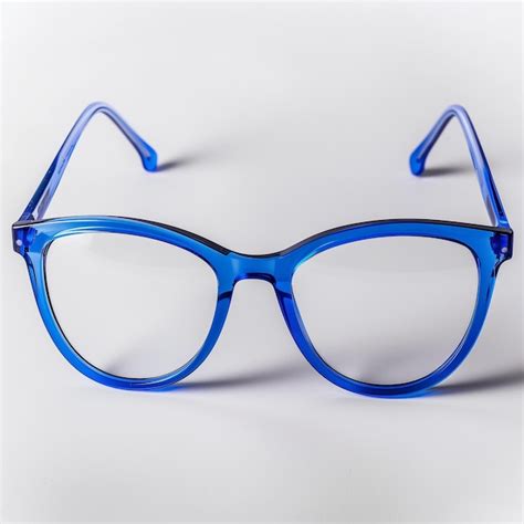 Blue plastic glasses on white | Premium Photo