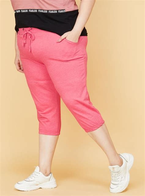 Buy Women Solid Drawstring Capris Online at just Rs. 699.0 ...