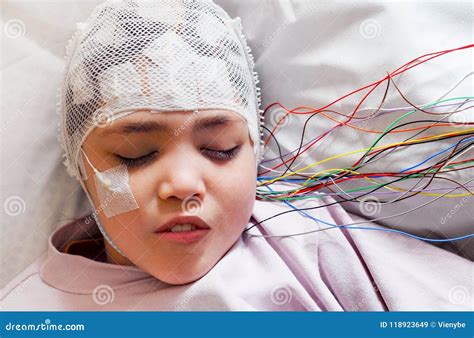 The Electroencephalogram EEG Head Cap With Flat Metal Discs Electrodes Attached To A White ...