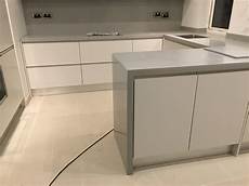 kitchen corian corian warm grey kitchen solid surface with waterfall kitchen corian corian warm grey kitchen solid surface with waterfall