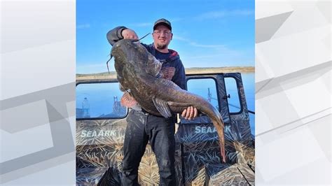 Fisherman catches catfish that sets new South Dakota record