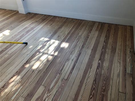 Sand and Finish Heart Pine flooring in Historic St. Augustine