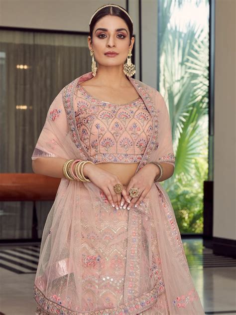 Peach Soft Net Semi Stitched Lehenga With Unstitched Blouse