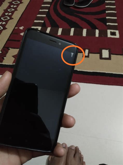 Is that something leaking from my dad's phone's display? It is an LCD screen, almost 5 years old ...