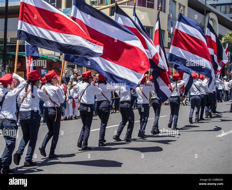 Young people carrying Costa Rican flags in Independence Day parade in ...