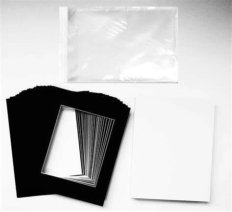 Studio 500 Mat Collection includes 25 8x10 Black Pre-Cut Mats, 25 White ...