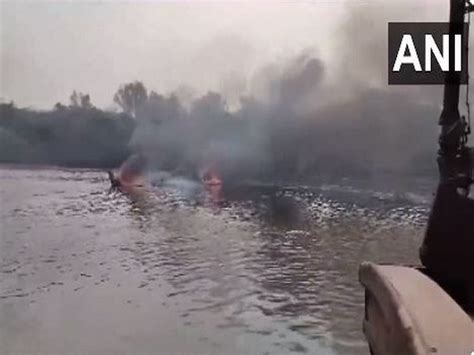 Andhra Pradesh: Boat docked at Nizampatnam harbour catches fire, capsizes