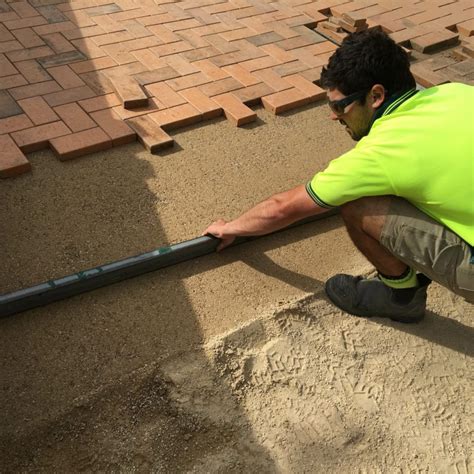 How to Level Out Brick Pavers: Step by Step - Eagle Pavers