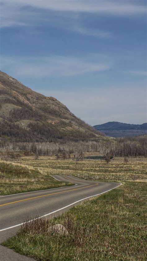 Download wallpaper 800x1420 road, turn, mountains, landscape iphone se ...