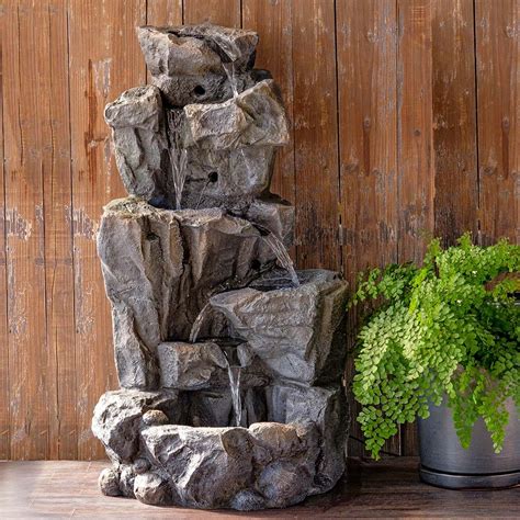https://www.thegardengates.com/cdn/shop/products/TWF041-SG_RockyFallsTieredFountain_StoneGrey.jpg?v=1674794530