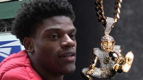 Lamar Jackson Immortalizes Iconic Play In $100,000 Diamond Chain