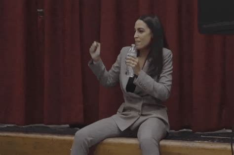 AOC busts a move after protesters crash town hall