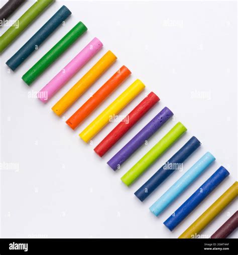 multi-color oil pastel crayons arranged on white background Stock Photo ...