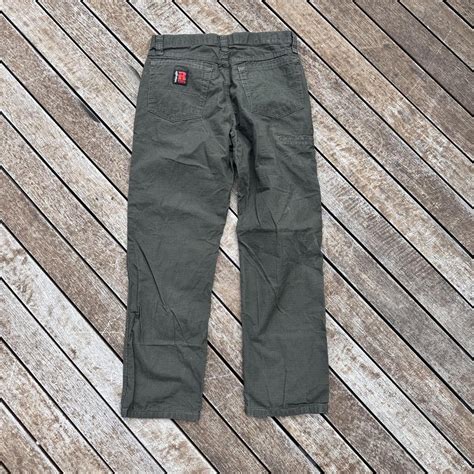 Wrangler work pants green Riggs 32-30 🛑there seems... - Depop