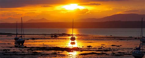 Download wallpaper 2560x1024 beach, sea, boats, sunset, dusk ultrawide ...