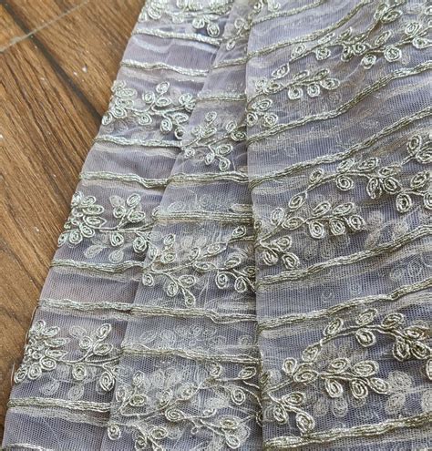 Light Mauve Floral Embroidered Net Fabric – Fabrics & More