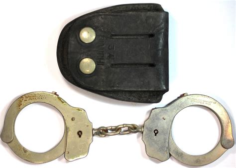 Lot - Vintage Handcuffs manufactured by 'the Peerless Handcuff Co ...