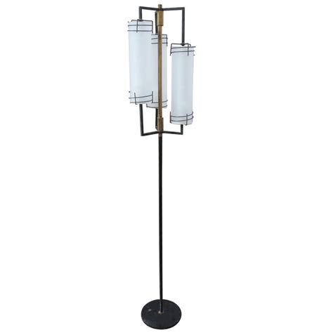 Italian Stilnovo Floor Lamp With Glass Globes And Brass Finishes at 1stDibs