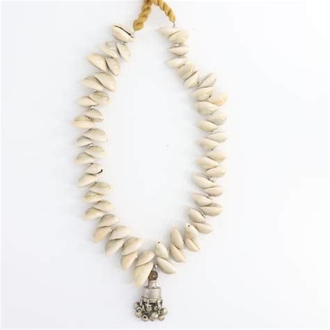 Shop Cowry and Repurposed Metal Necklace by Whe by Abira on CreCo.in