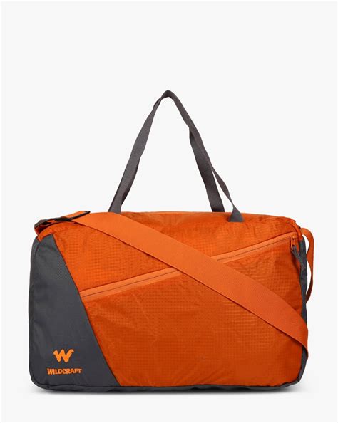 Buy Orange Wildcraft Tinker Water-Resistant Panelled Duffel Bag | AJIO
