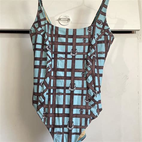 Red or Dead Women's Blue and Brown Swimsuit-one-piece | Depop
