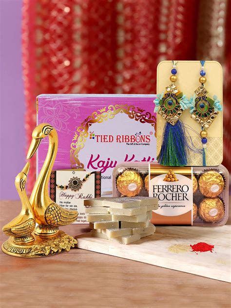 Buy | Premium Lumba Rakhi Set with Chocolates, Kaju Katli and Brass ...