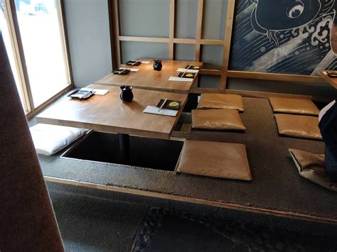 This sushi restaurant has tables that simulate traditional Japanese ...