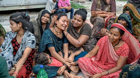 Grieving Relatives of India Air Crash Victims Wait for Bodies to Be ...