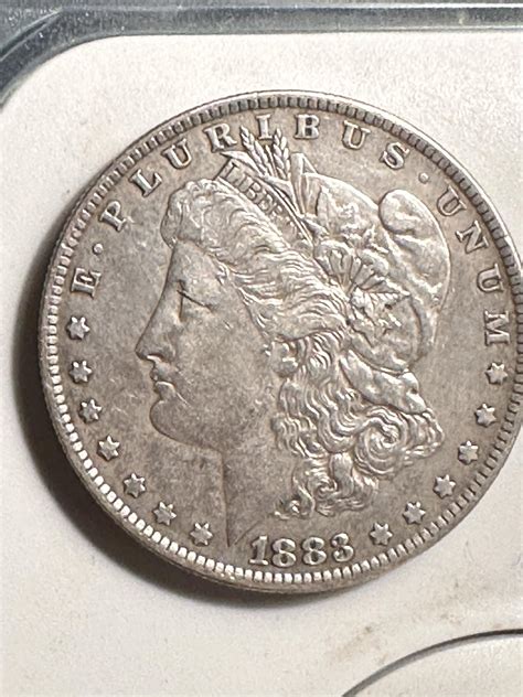 What is the value of this 1883 silver dollar? : r/coins