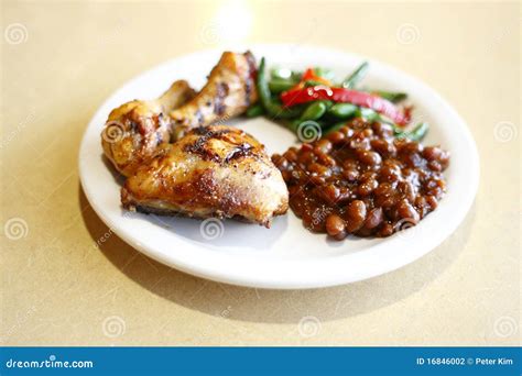 Baked chicken with sides stock photo. Image of peas, baked - 16846002