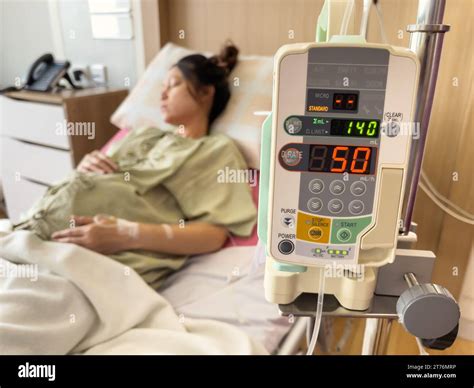 automatic infusion IV drip saline pump machine with pregnant woman ...