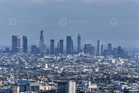 Downtown Los Angeles skyline over blue cloudy sky in California from ...