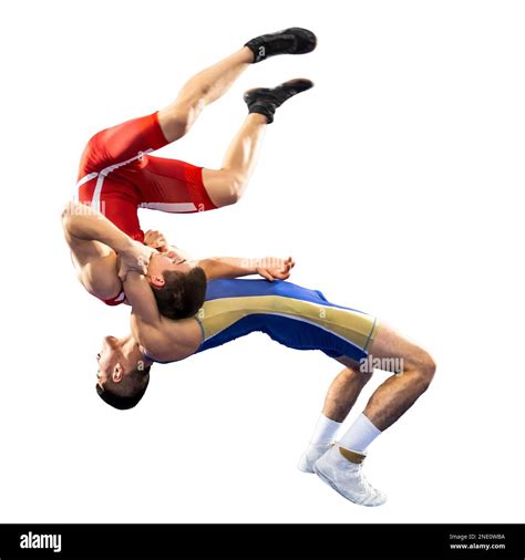 The concept of fair wrestling. Two greco-roman wrestlers in red and ...