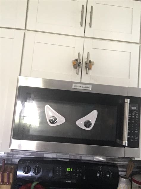 My wife put the huge googly eyes on the microwave, now I feel like I’m ...