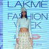 A model showcases a creation by designers Sonam and Paras Modi on Day 4 ...