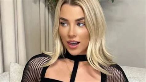 Glam footballer Madelene Wright sends fans wild in see-through fishnet outfit as she pulls ...