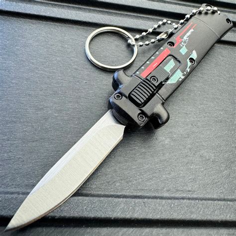 Punisher Mini Stiletto OTF Knife Keychains - MEGAKNIFE