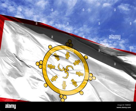 waving flag of Sikkim close up against blue sky Stock Photo - Alamy