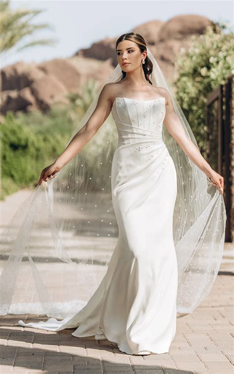 Modern Satin Wedding Dress with 3D Floral Accents and Corset Bodice
